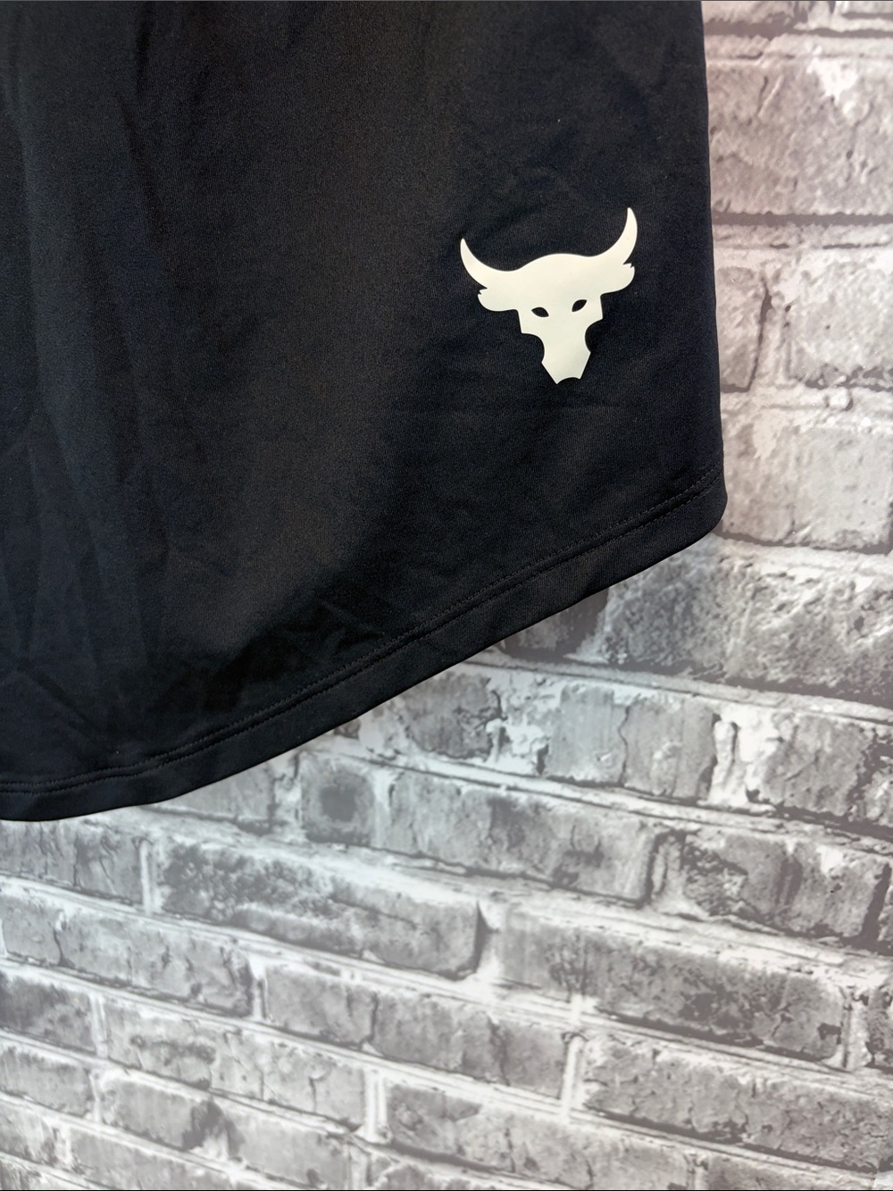 Under armour Womens 
Black Performance‎ Shirt  with White Bull Logo